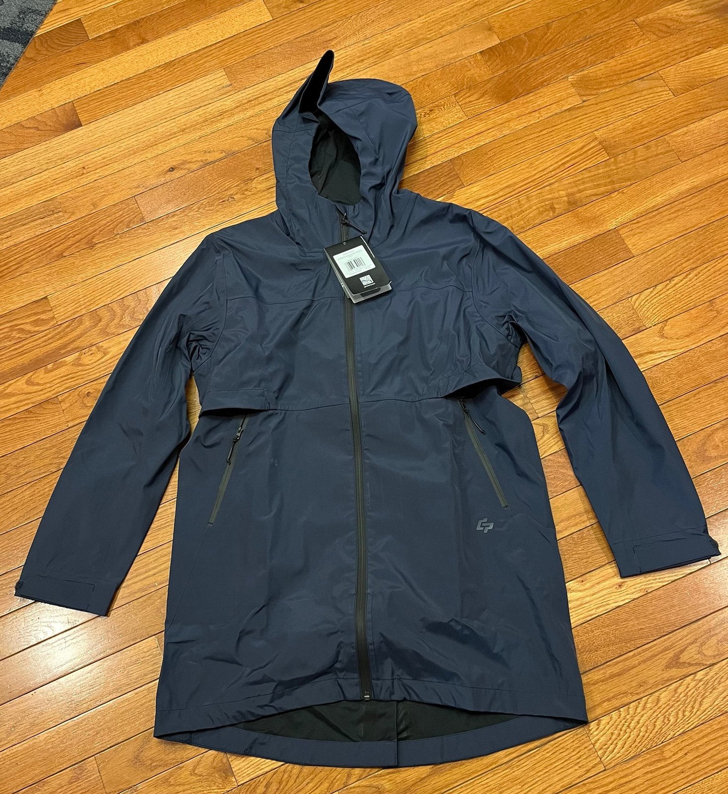 Popular Navy rain jacket  Size large but fits like size